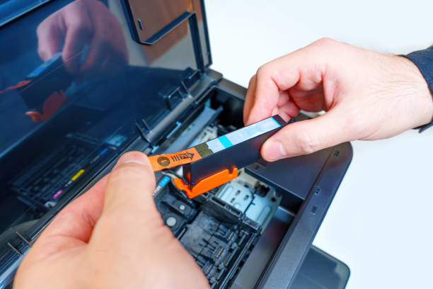 Removing Protective Tab from a New Inkjet Cartridge