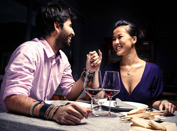 istock Couple smiling with red wine for St. Valentine 156938729