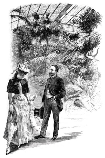 istock Frankfurt am Main, Palmengarten, elegant couple with daughter standing in the palms house 1569402750
