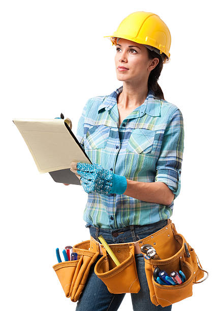 Woman Construction Contractor Carpenter Isolated on White Background Woman Construction Contractor Carpenter Isolated on White Background woman wearing tool belt stock pictures, royalty-free photos & images