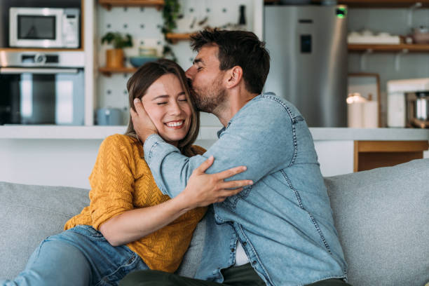 Happy couple at home. stock photo