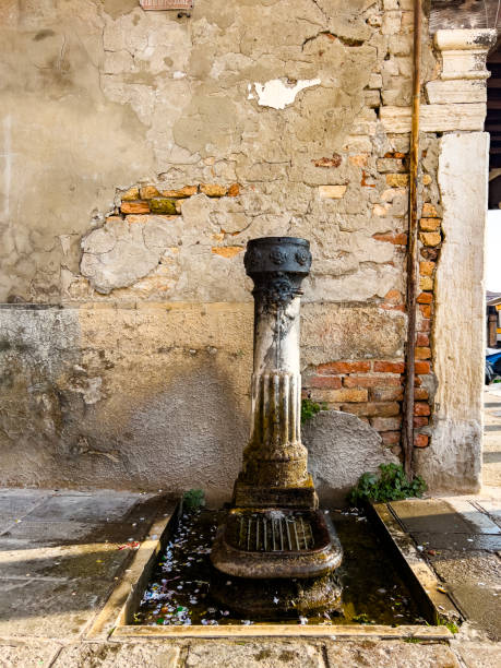 istock Bronze water fountain in Venice 1569410368