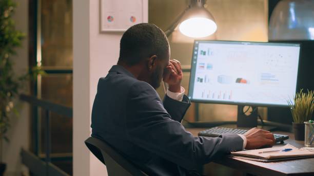 istock Employee fed up with loud colleague 1569435241