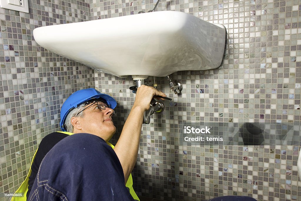 Klempner bei der Arbeit - Lizenzfrei Arbeiten Stock-Foto