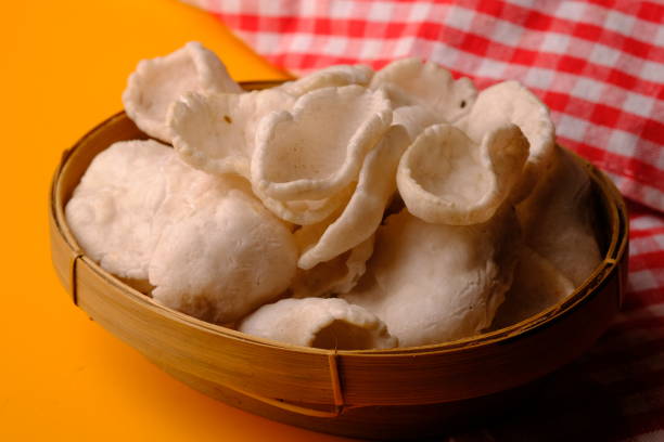 istock Poor crackers, krupuk mlarat, krupuk upil. Indonesian savory crackers made from tapioca starch, salt, and shrimp paste or shrimp paste. fried using sand, not cooking oil. Krupuk Cirebon West Java. 1569441197