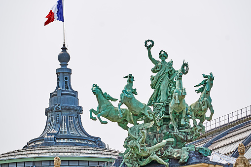 Paris, France - July 10, 2023: Statue on the Grand Palais on the Champs Elysee in Paris.