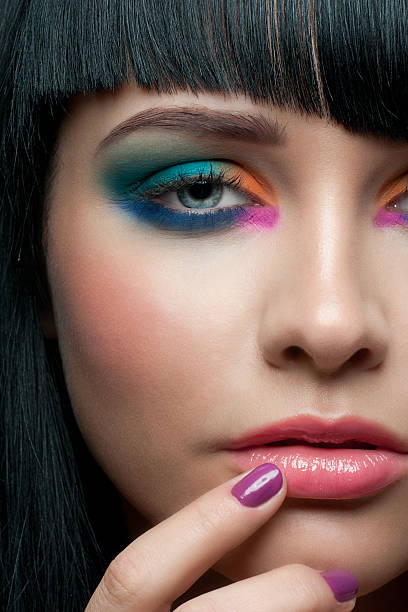 istock Woman with colorful stylish make-up 156946075