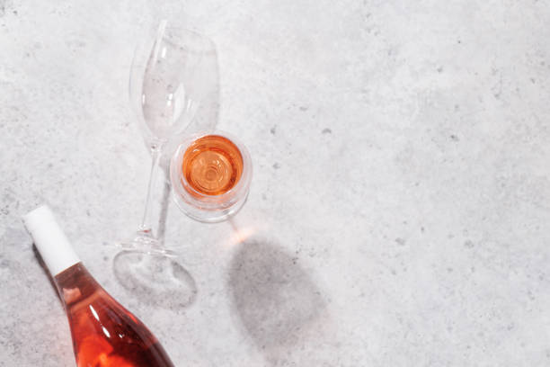 istock Refreshing rose wine by the pool on a sunny day 1569467686