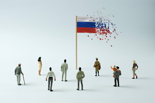 Russian flag disintegrating (the concept of economic crisis, pandemic, internal opposition, terrorism, refugees, etc.)
