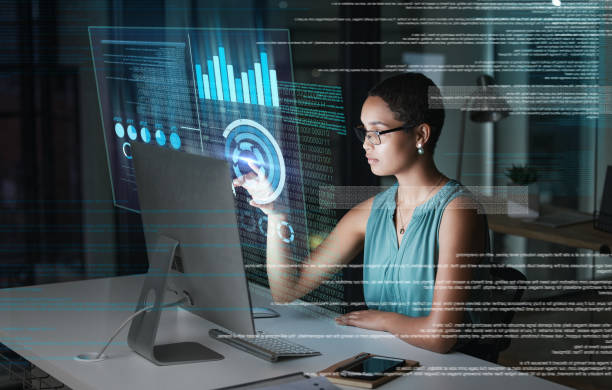 istock Computer hologram, finance or woman point at future administration dashboard, research chart or ui software. Digital transformation, cloud computing overlay or African accountant review data analysis 1569472056