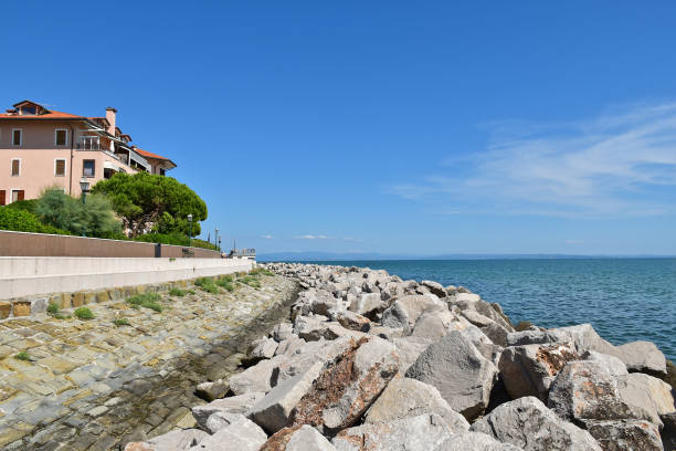 istock Beach next to the sea at Grado, Italy 1569484322