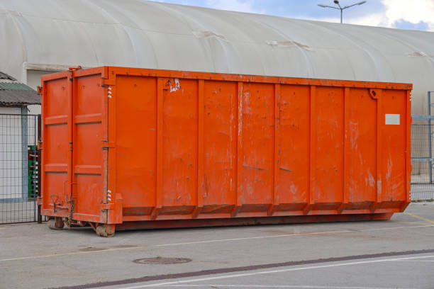 Roll Off Dumpster Large Orange Roll Off Dumpster Industrial Waste Management large dumpster stock pictures, royalty-free photos & images