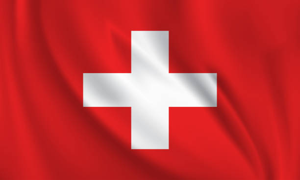 istock Waving flag of Switzerland blowing in the wind. Full page flying flag 1569505493