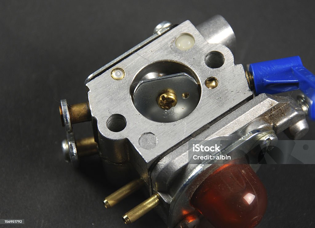 Engine and carburator Stock pictures of a small gas engine and a carburetor Carburetor Stock Photo
