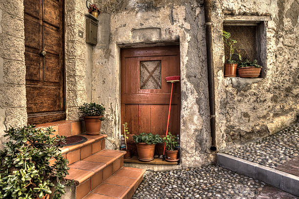 Historic stone house with old wooden door at the top