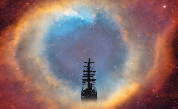 istock An old sailing ship in the mist sails towards the rocks - Supernova explosion in the background 1569548606