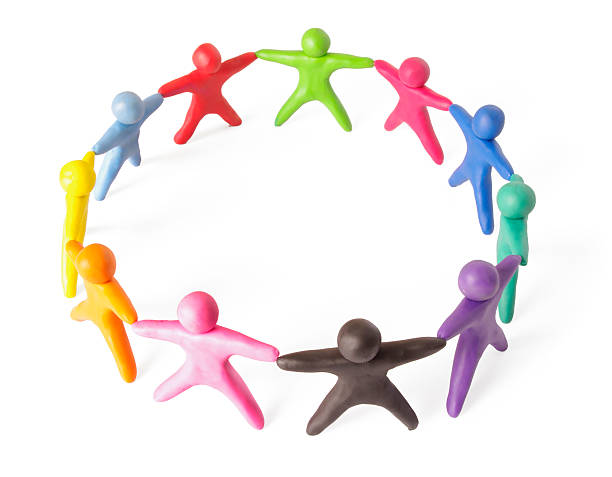 istock Human figures from plasticine stand in a circle 156957297