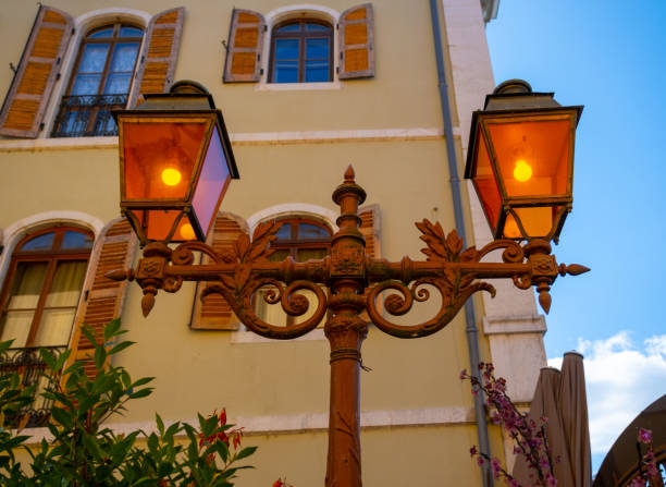 Orange old lampposts in Annecy