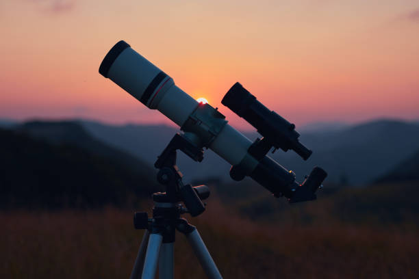 istock Astronomical telescope for observing planets, Moon, Sun, stars, comets and other celestial objects. 1569617540