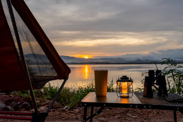 istock Empty chair with sunset view. Camping and outdoor lifestyle. 1569628974