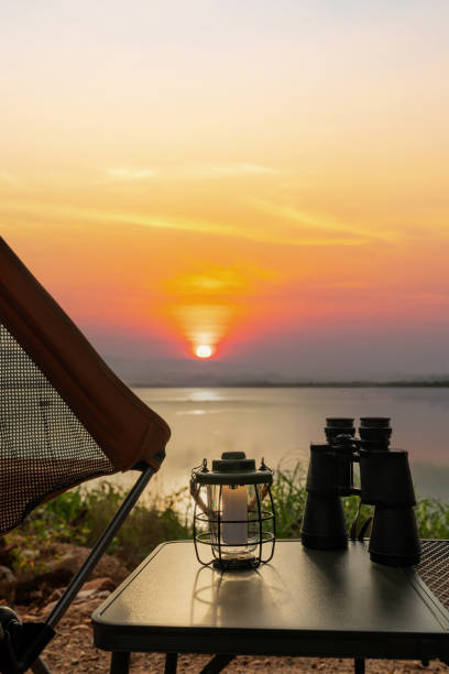 istock Empty chair with sunset view. Camping and outdoor lifestyle. 1569629495
