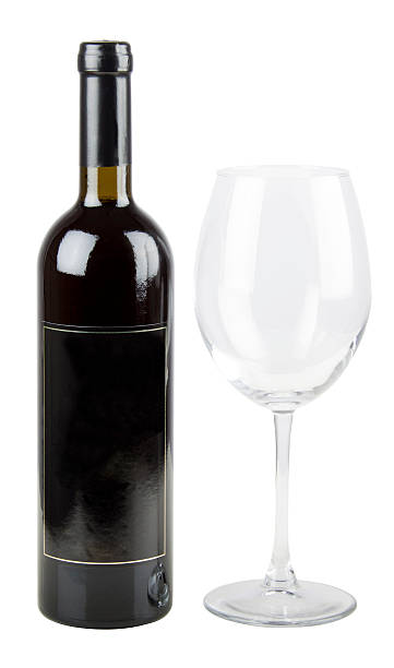 Red wine bottle with glass stock photo