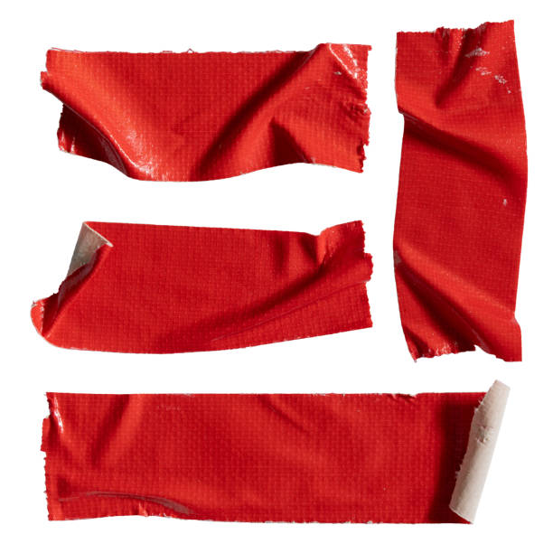 istock Peeled red cloth tapes on white background 1569650359