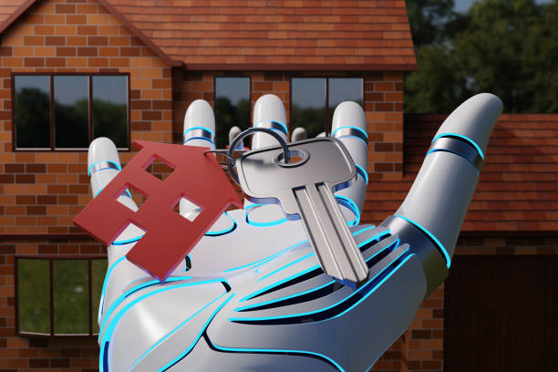 istock Robotic hand holding a key with a red house shaped key holder with a brick house as background. Illustration of the concept of artificial intelligence (AI) powered online house searching platform 1569657331