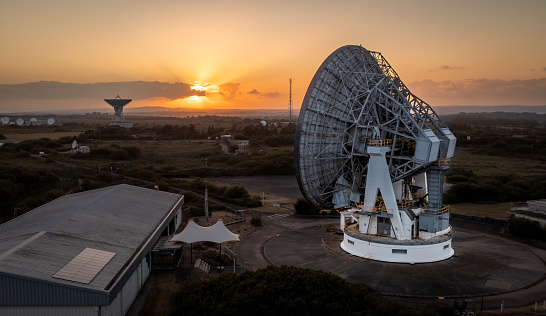 Goonhilly Satellite Earth Station, Cornwall, UK - July 2, 2023.  Aerial view of a satellite dishes at Goonhilly Satellite Earth Station in Cornwall at sunset
