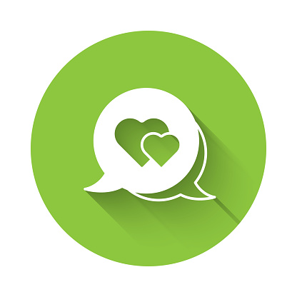 White Heart in speech bubble icon isolated with long shadow background. Happy Valentines day. Green circle button. Vector.