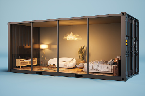 Modern Bedroom Interior With Bed Furniture, Sofa And Television Set In Cargo Container