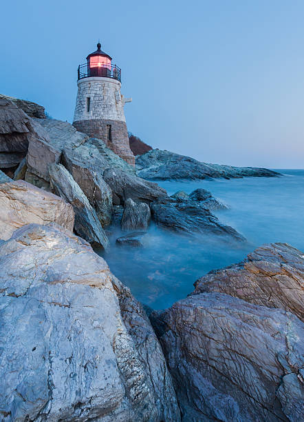 Castle Hill Lighthouse Dusk view of the famous lighthouse located in Narragansett Bay, Newport, Rhode Island newport rhode island stock pictures, royalty-free photos & images