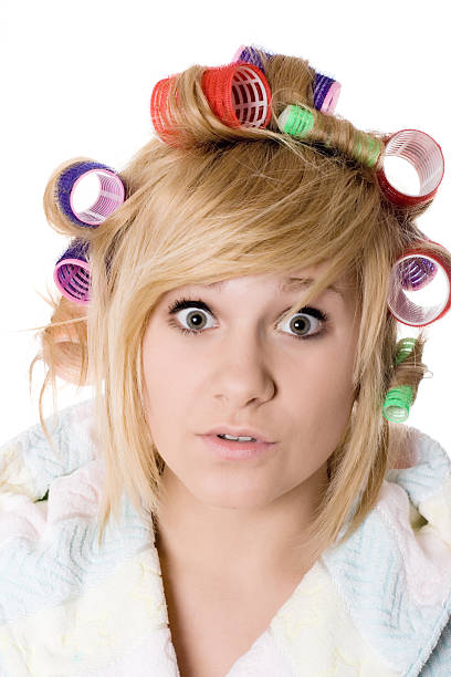 istock funny housewife with curlers 156977000