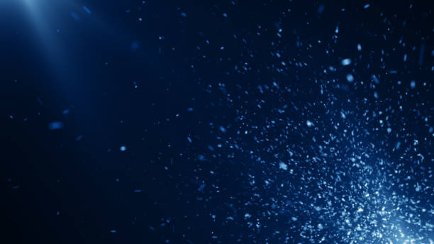 istock Particles Blue dust abstract light bokeh motion titles cinematic background 1569783736