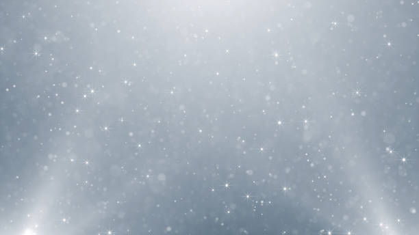 istock Particles white business bright glitter bokeh dust abstract background 1569783782