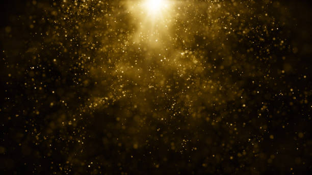 istock Particles gold glitter bokeh award dust abstract background 1569784306