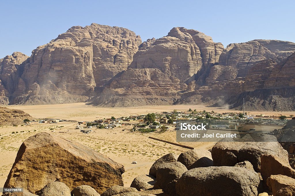 Rum Village, Jordan Rum Village in Wadi Rum, Jordan. The small community is composed of Bedouin who chose to settle rather than continue the more traditional nomadic life. Stone - Object Stock Photo