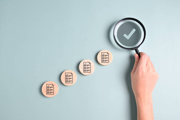 istock Correct checklist icons and magnifying glass for business document management and checking system, Online documentation database, document folder, Online approve paperless and quality assurance 1569815971
