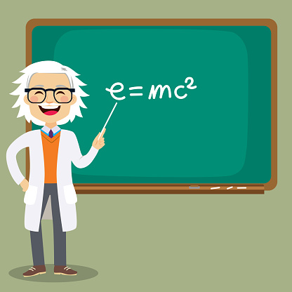 Old senior male science teacher teaching lesson in front of blackboard pointing at mass energy equivalence e=mc2 formula