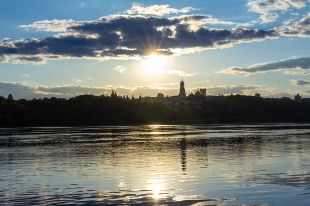 istock Sun and clouds at sunset over Kyiv-Pechersk Lavra 1569834824