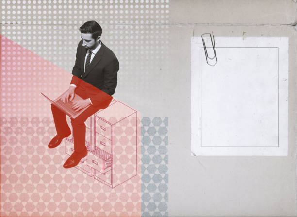 istock Businessman searching files in the archive 1569864727