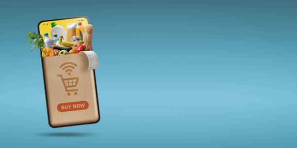 istock Online grocery shopping app on smartphone 1569869988
