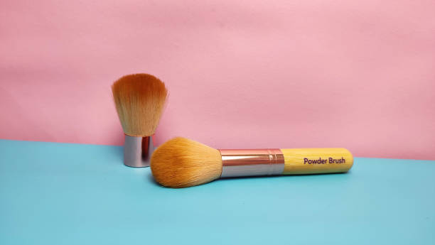 istock colorful background with beauty brushes. 1569890083