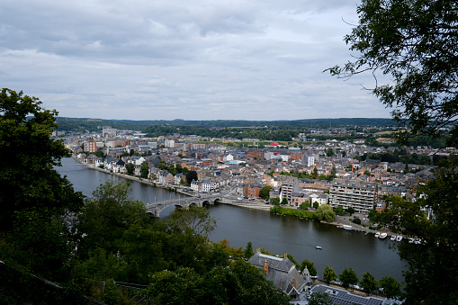 Cars pass from the bridge in the city center of Namur in Belgium on July 22, 2023.