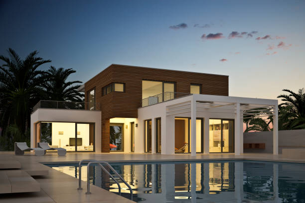 istock Modern mediterranean villa with pool in the evening 1569912368