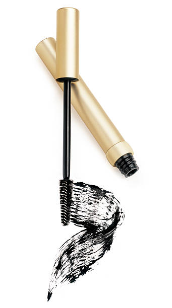 Mascara and wand applicator Mascara, wand applicator and black stroke against white background mascara wands stock pictures, royalty-free photos & images