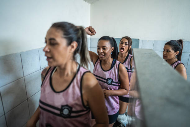 istock Female volleyball team going to the match 1569939168