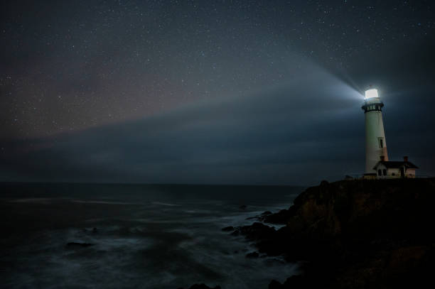 istock Pigeon Point Lighthouse at night with fog rolling in. 1569960038