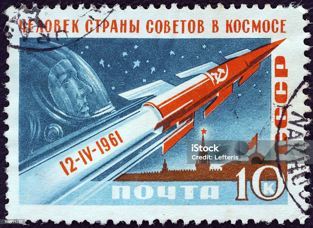 USSR stamp shows Rocket, Gagarin and Kremlin (1961) USSR - CIRCA 1961: A stamp printed in USSR from the "World's First Manned Space Flight" issue shows Rocket, Gagarin and Kremlin. Inscribed 12-IV-1961 Yuri Gagarin Stock Photo