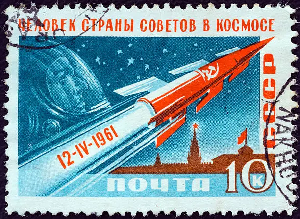 USSR - CIRCA 1961: A stamp printed in USSR from the "World's First Manned Space Flight" issue shows Rocket, Gagarin and Kremlin. Inscribed 12-IV-1961